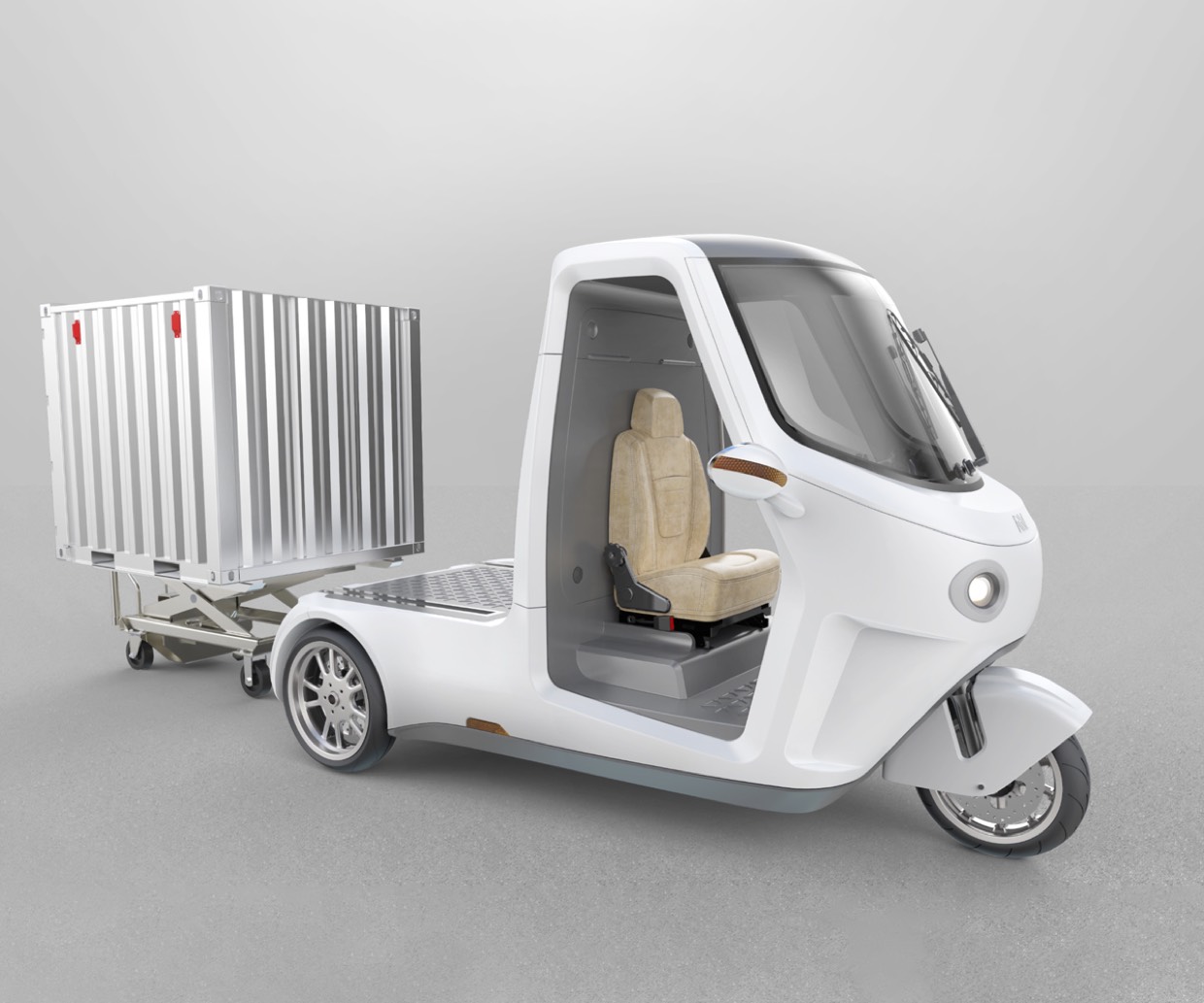 Weisses e-Tuk SmarTuk als Fahrgestell mit abgesetztem Container.